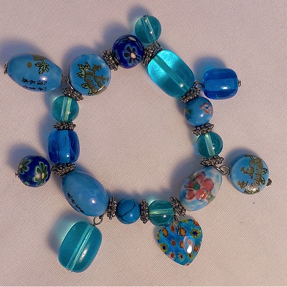 Beaded bracelet designed with turquoise stones and unique glass & worked clay. - Picture 12 of 12